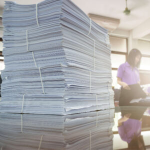 pile-papers-on-desk