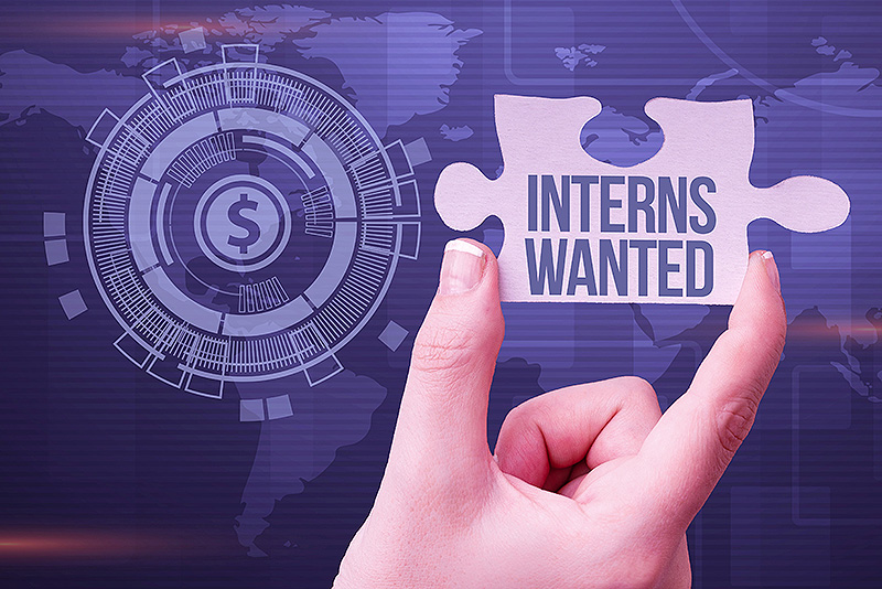 Inspiration showing sign Interns Wanted, Concept meaning Looking for on the job trainee Part time Working student Hand Holding Jigsaw Puzzle Piece Unlocking New Futuristic Technologies.